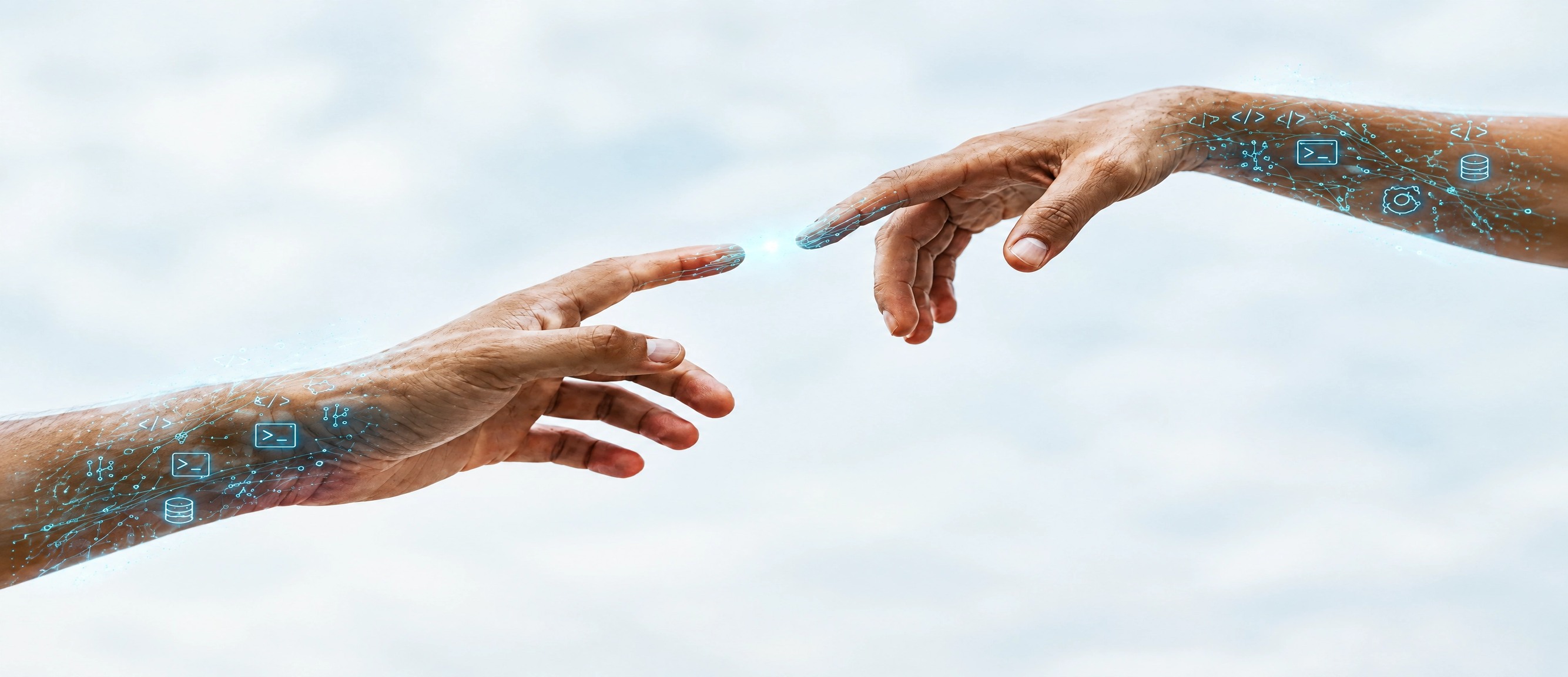 Two hands reaching toward each other, one digital, one human
